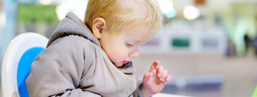 Toddler Boy Playing With A Digital Tablet